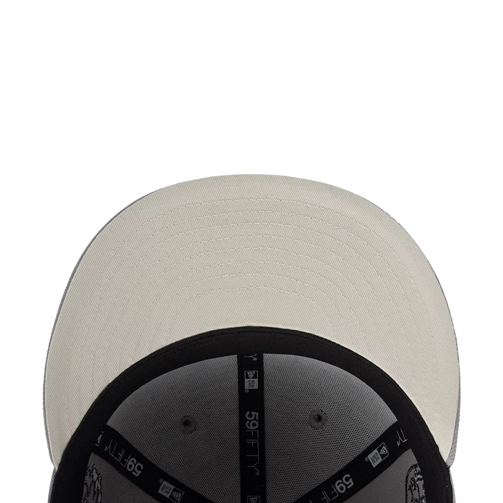 Pictured is this New Era X Mora All Over Characters 59FIFTY Fitted cap in grey. 2