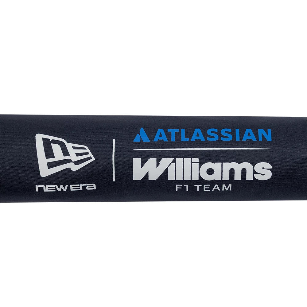 New Era Williams Team Navy Umbrella, close-up showing three prominent logos: the white New Era flag logo on the left, the blue Atlassian logo in the centre, and the large white Williams F1 Team logo on the right, all set against a navy fabric.