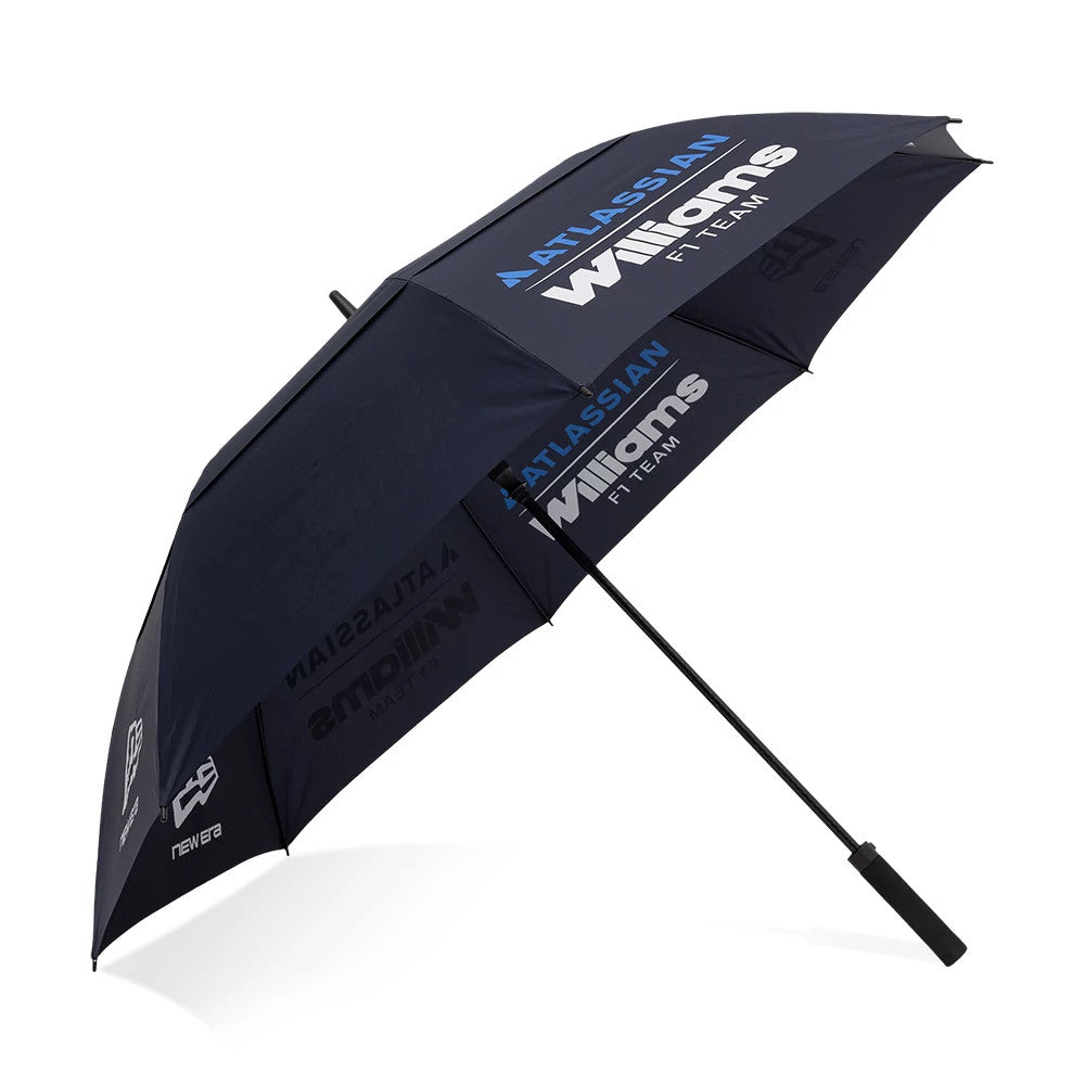 New Era Williams Team Navy Umbrella, three-quarter view showing the large Williams Racing logo in white on alternating panels, Atlassian branding in blue, and the New Era logo in white on one of the dark navy panels.