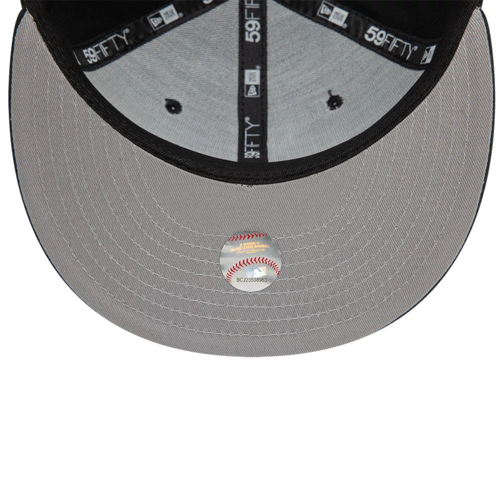 LA Dodgers MLB Heart Icon Black New Era 59FIFTY Fitted Cap, inside view showing the grey undervisor with a baseball graphic sticker, black sweatband and branded black taping featuring 59FIFTY and New Era logos.