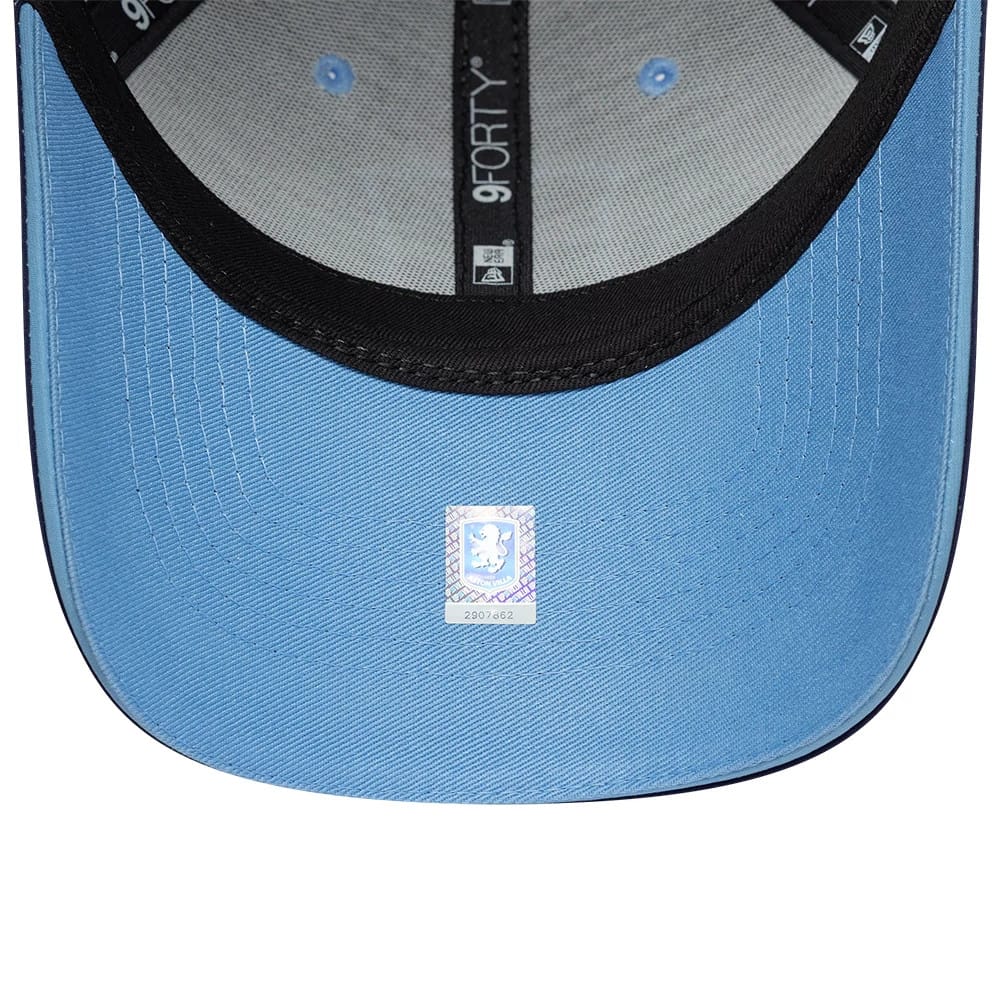 Aston Villa FC 96 Navy New Era 9FORTY Adjustable Cap, inside view showing the light blue undervisor with white stitching, a 9FORTY label on black taping running across the grey crown, and a holographic sticker at the visor's centre.