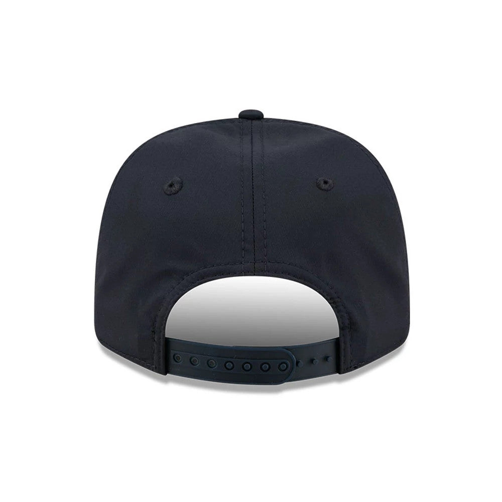 Pictured is this New Era Golf 9SEVENTY Split Panel Stretch Snap cap in navy. 7