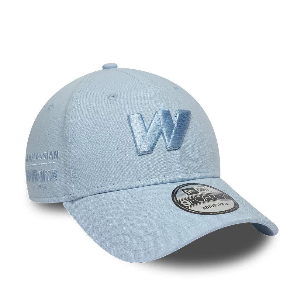 Williams New Wave Linen Pastel Blue New Era 9FORTY Adjustable Cap, front view showing a large raised embroidered W logo in blue on the front panel, with a curved visor featuring a 9FORTY size sticker and side embroidery details.