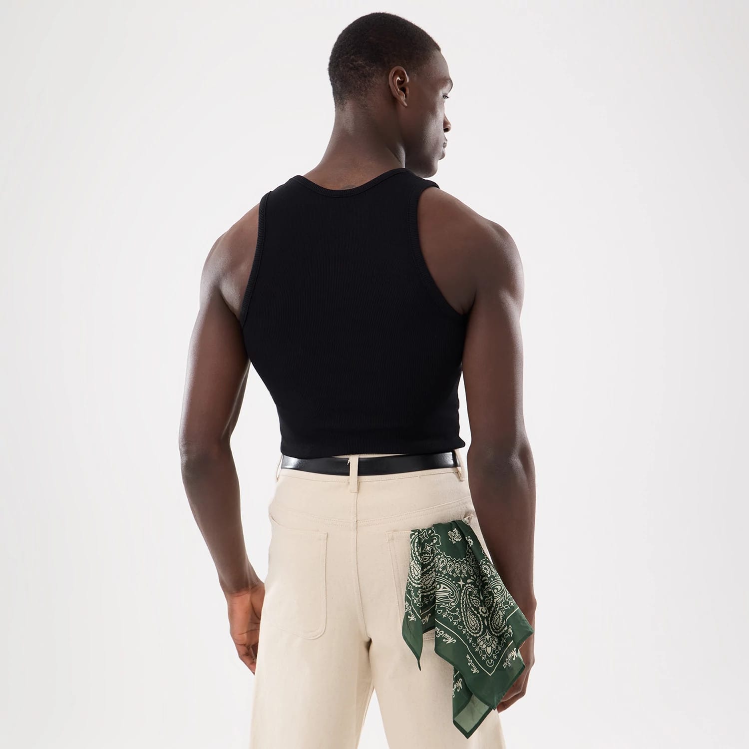 The model is wearing this New Era Rib Vest in black. 2