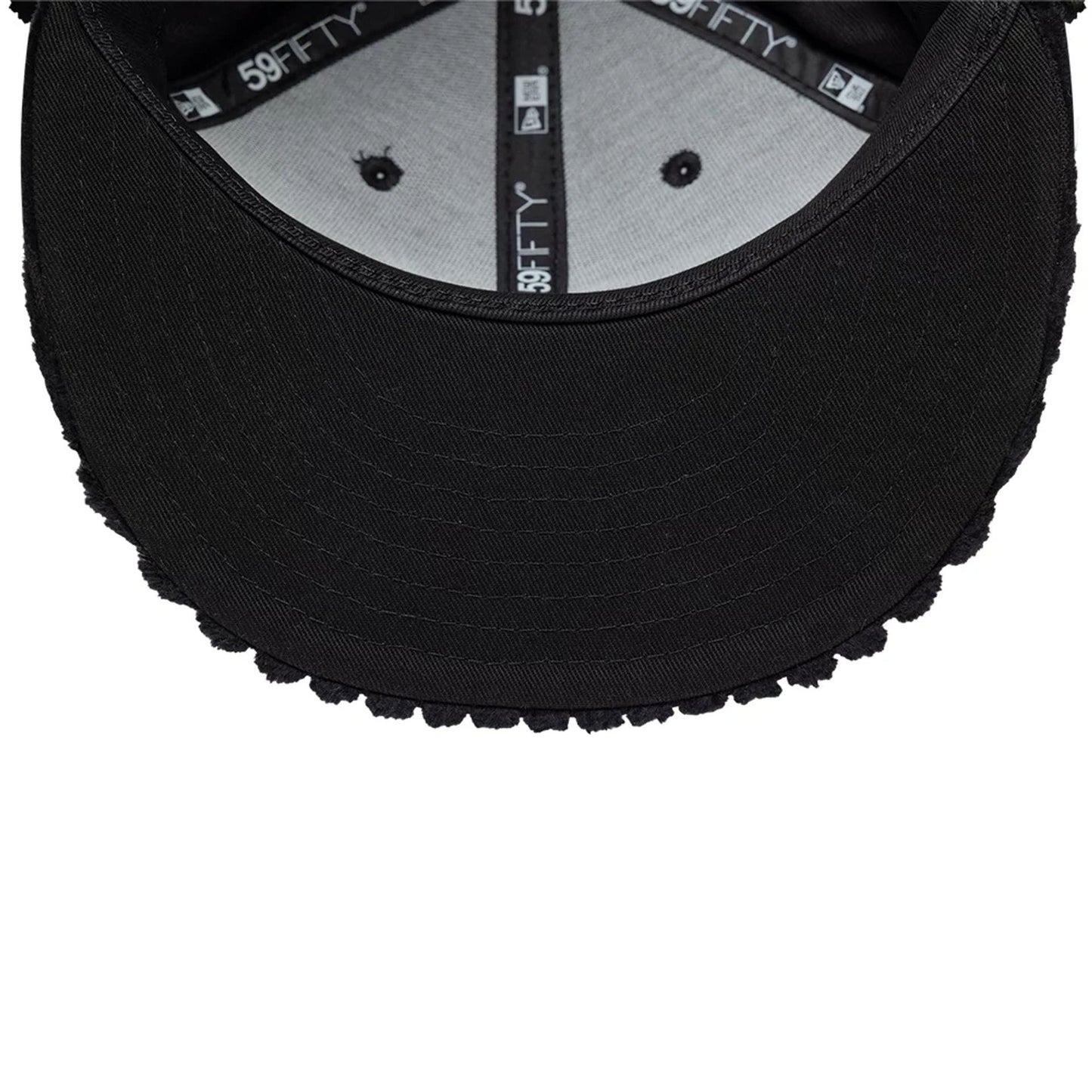 Pictured is this Mains X New Era Cord Dogear 59FIFTY Fitted cap in black. 11