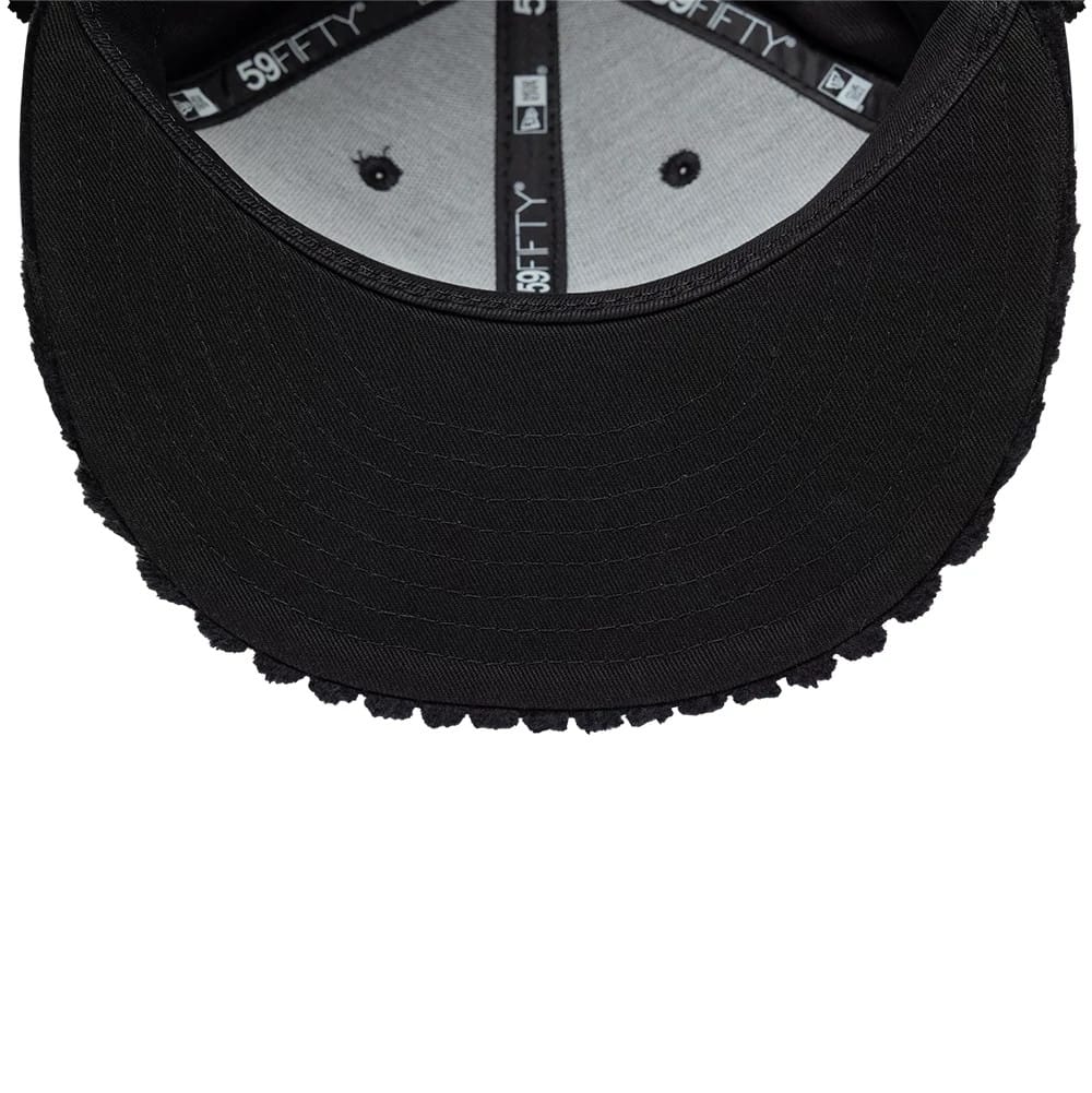 Pictured is this Mains X New Era Cord Dogear 59FIFTY Fitted cap in black. 11
