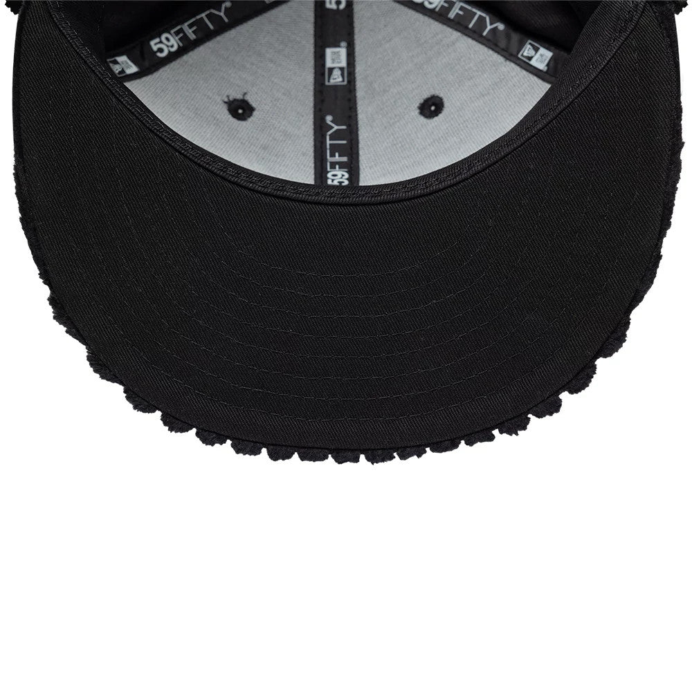 Pictured is this Mains X New Era Cord Dogear 59FIFTY Fitted cap in black. 11