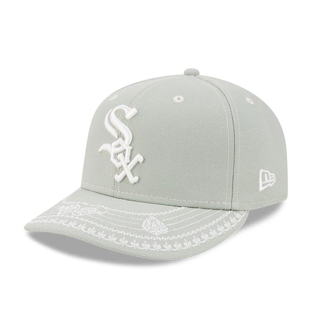 Chicago White Sox MLB Pastel Green New Era 59FIFTY Fitted Cap, three-quarter view showing a white raised embroidered Sox logo on the front panel, intricate white embroidery on the pastel green visor, and a white New Era flag logo on the left side.