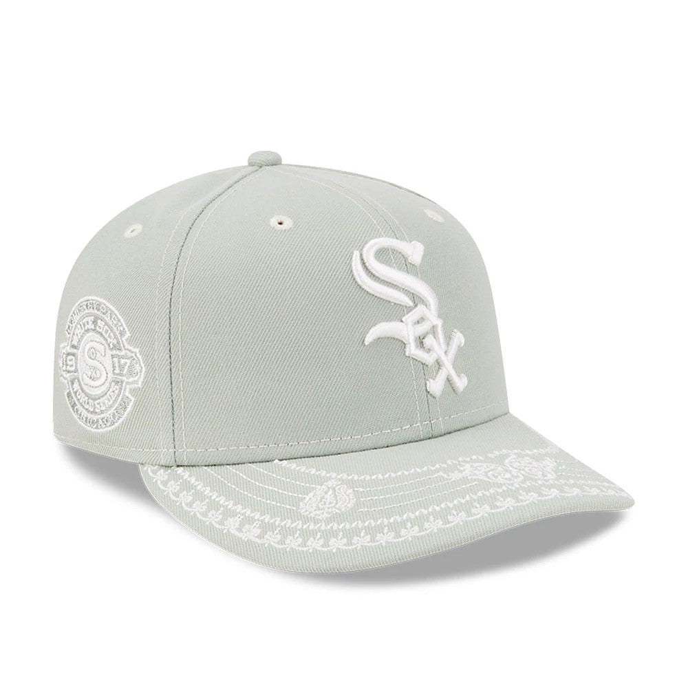 Chicago White Sox MLB Pastel Green New Era 59FIFTY Fitted Cap, front view showing the white embroidered Sox logo on the crown, the intricate paisley pattern embroidered on the visor, and the 1917 badge on the right side.