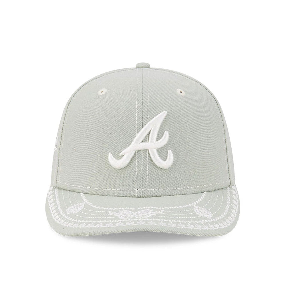 Atlanta Braves MLB Pastel Green New Era 59FIFTY Fitted Cap, front view showing a white embroidered A logo on the structured crown, with matching detailed embroidery on the visor and two embroidered eyelets on each front panel.