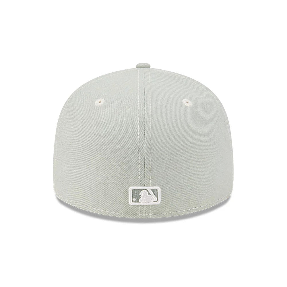 Atlanta Braves MLB Pastel Green New Era 59FIFTY Fitted Cap, rear view showing the white embroidered MLB Batterman logo centred on the back panels, with evenly spaced embroidered eyelets and a matching pastel green top button on the structured crown.