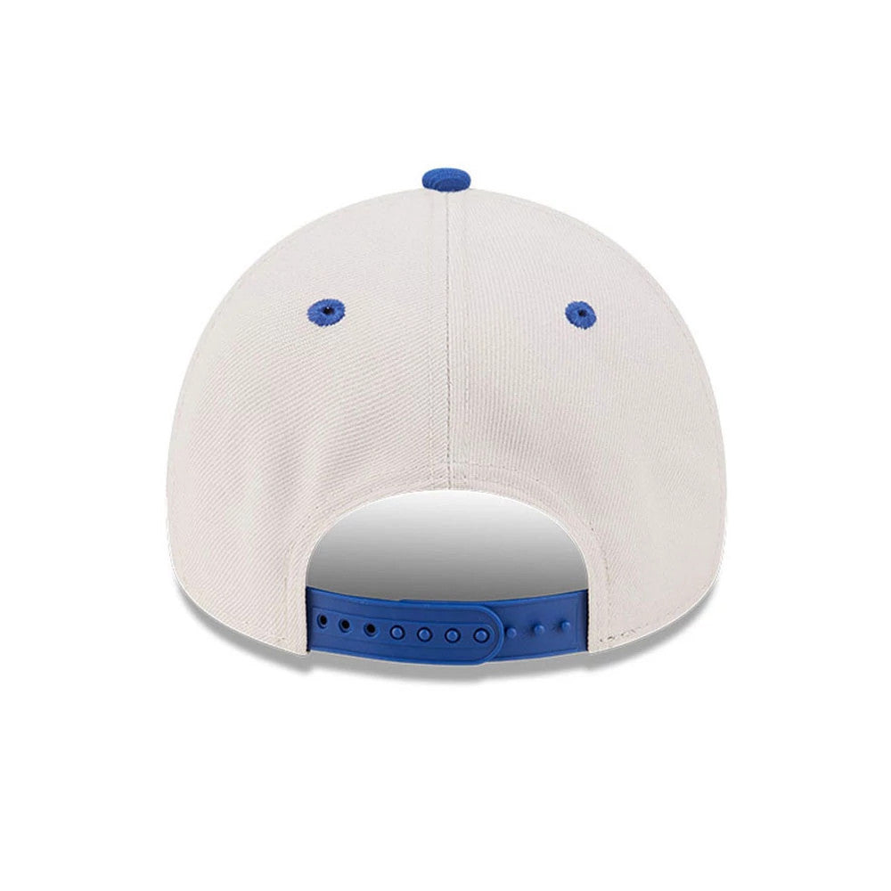 Pictured is this NBA Hardwood Classic New York Knicks 9FORTY A-Frame Adjustable cap in light beige & blue. 7
