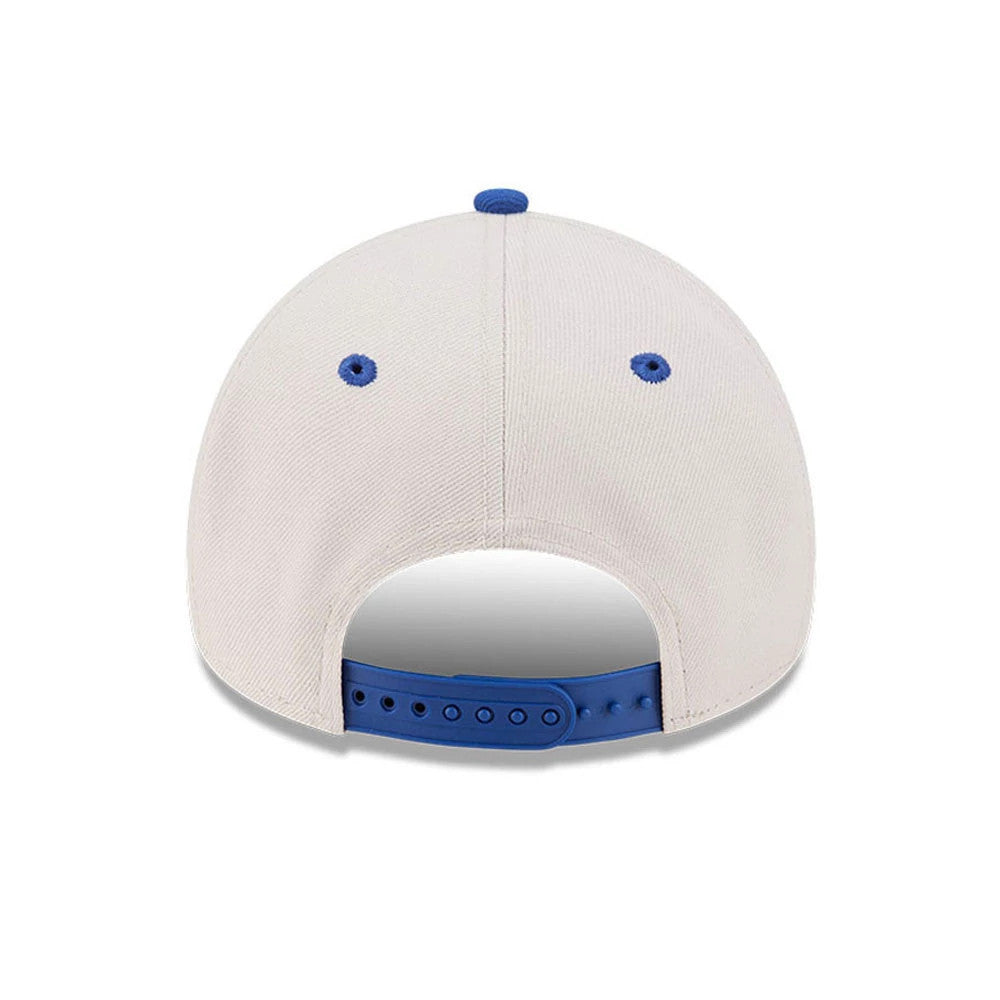 Pictured is this NBA Hardwood Classic Buffalo Braves 9FORTY A-Frame Adjustable cap in light beige & blue. 7