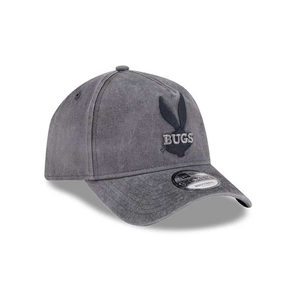 Bugs Bunny Looney Tunes Grey New Era 9FORTY A-Frame Adjustable Cap, three-quarter view featuring a raised black Bugs Bunny silhouette with 'BUGS' text embroidered on the front panel, a curved grey visor.
