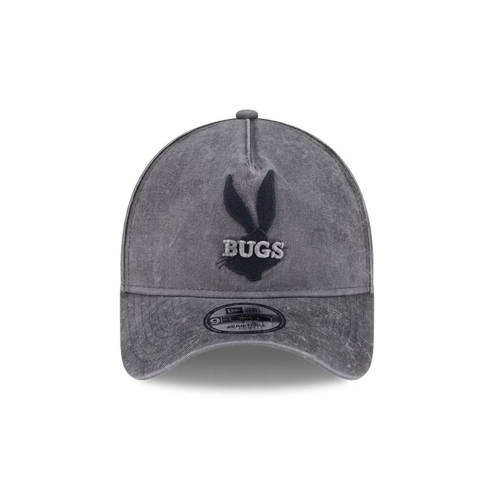 Bugs Bunny Looney Tunes Grey New Era 9FORTY A-Frame Adjustable Cap, front view showing raised dark embroidered Bugs Bunny silhouette and BUGS text on the structured grey crown with a curved visor and a centred 9FORTY size sticker.
