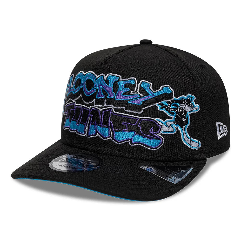 Pictured is this Looney Tunes Bugs & Daffy 9FIFTY A-Frame Snapback Adjustable cap in black. 1