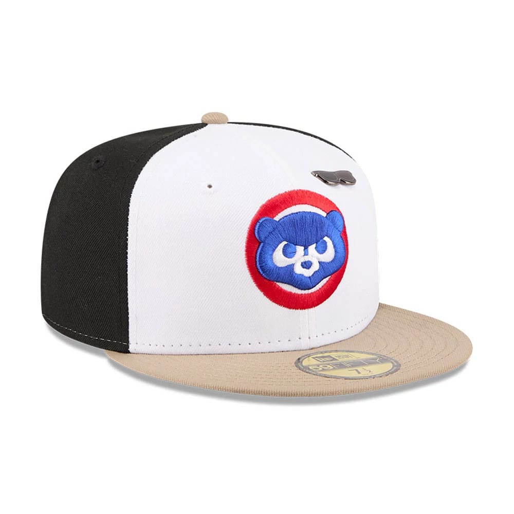 Chicago Cubs MLB X Ferris Bueller's Day Off White New Era 59FIFTY Fitted Cap, three-quarter view showing the blue embroidered Cubs logo on the white front panels, with a beige flat visor featuring a gold 59FIFTY size sticker and a brown top button.