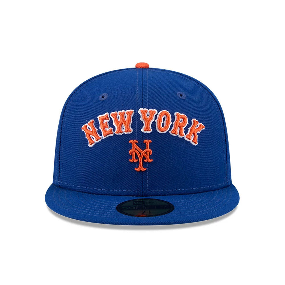 New York Mets MLB X Seinfeld Blue New Era 59FIFTY Fitted Cap, front view showing raised orange embroidered NEW YORK and Mets logo on the structured blue crown, with a matching blue visor and black 59FIFTY size sticker.