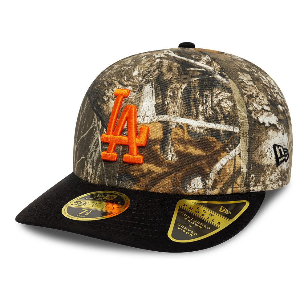 LA Dodgers MLB Realtree Assorted Print Low Profile New Era 59FIFTY Fitted Cap, three-quarter view showing an orange raised embroidered LA logo on the front panels, black curved visor with gold 59FIFTY size sticker.