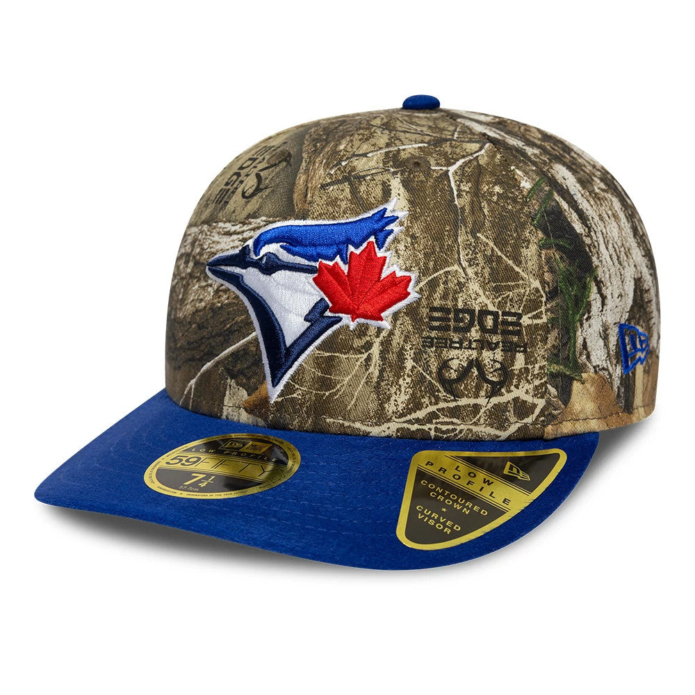 Toronto Blue Jays MLB Realtree Assorted Print Low Profile New Era 59FIFTY Fitted Cap, front view showing a raised embroidered team logo in blue, white, and red on the camo crown, with a royal blue visor and gold 59FIFTY size sticker.