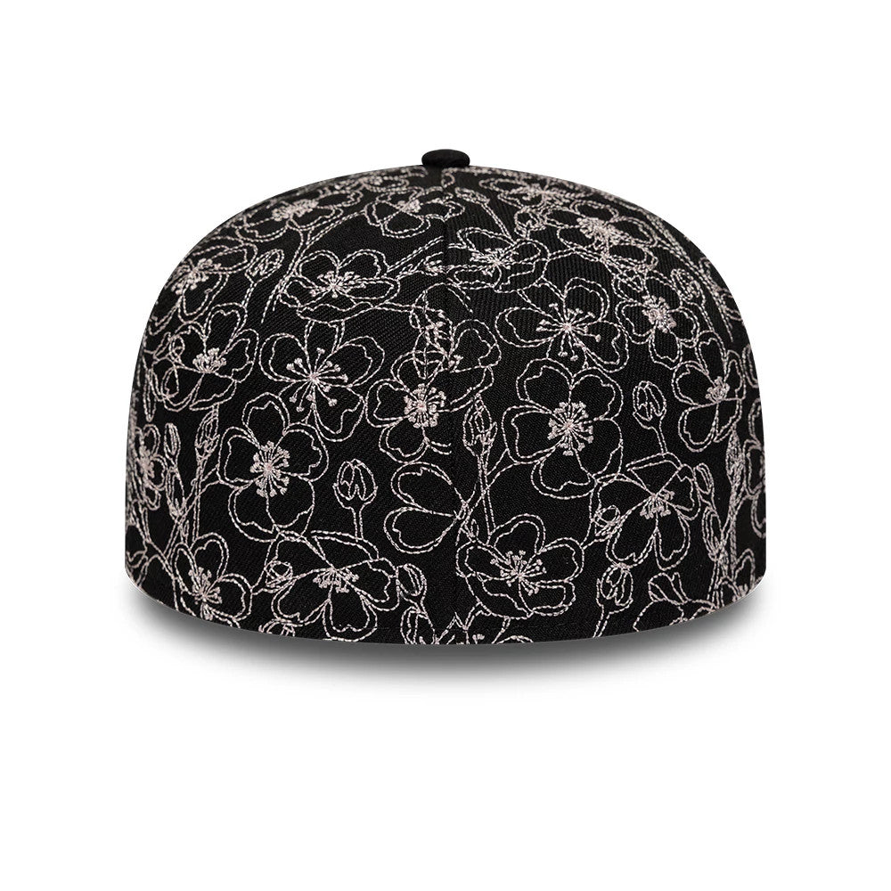 New Era Cherry Blossom Black 59FIFTY Fitted Cap, rear view showing intricate floral embroidery in white across the black crown, the top button in black, and seamless design without any logos or size stickers.