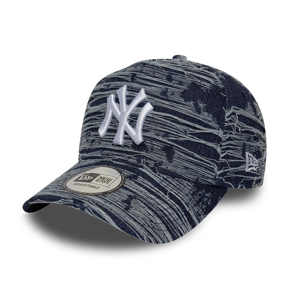 New York Yankees MLB Distressed Denim Navy New Era 9FORTY E-Frame Adjustable Cap, three-quarter view showing the white raised embroidered NY logo on the front panel, curved visor with 9FORTY size sticker, and New Era flag logo on the left side.