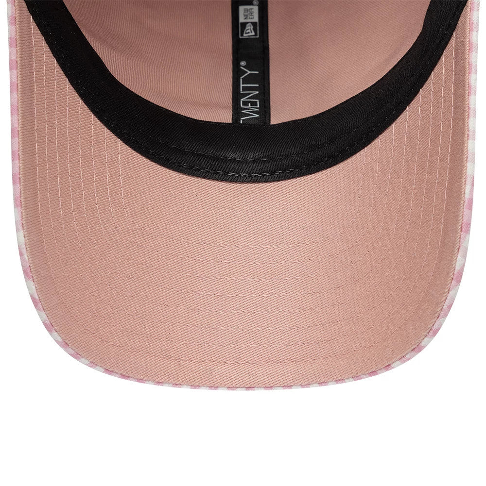New Era Gingham Bowback Pastel Pink 9TWENTY Adjustable Cap, inside view showing the pastel pink undervisor with black sweatband, and a black taping strip featuring a white New Era logo and 9TWENTY label.