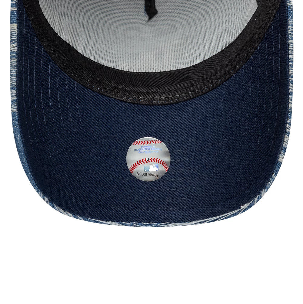 LA Dodgers MLB Distressed Denim Blue New Era 9FORTY E-Frame Adjustable Cap, inside view showing the dark blue undervisor with a baseball graphic sticker at the centre, alongside dark taping and a black sweatband around the rim.