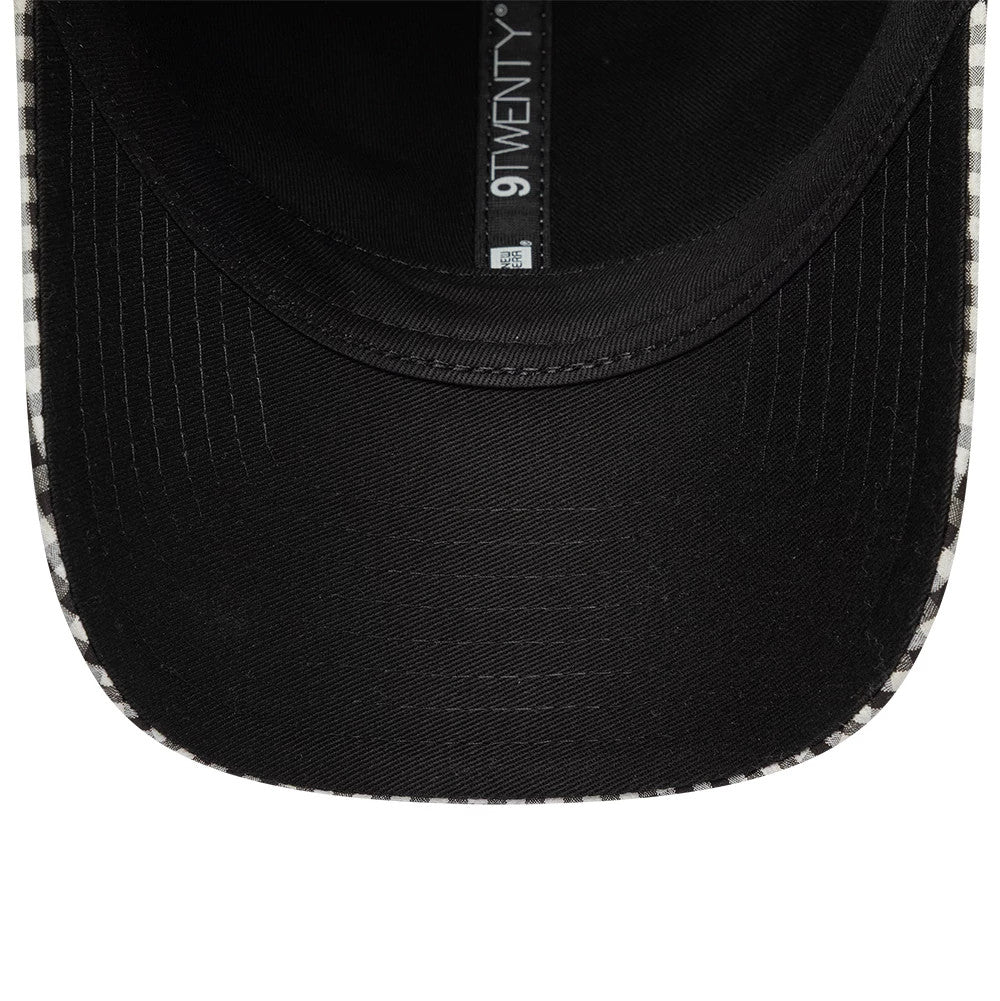 Pictured is this New Era Gingham Bowback 9TWENTY Adjustable cap in black. 7