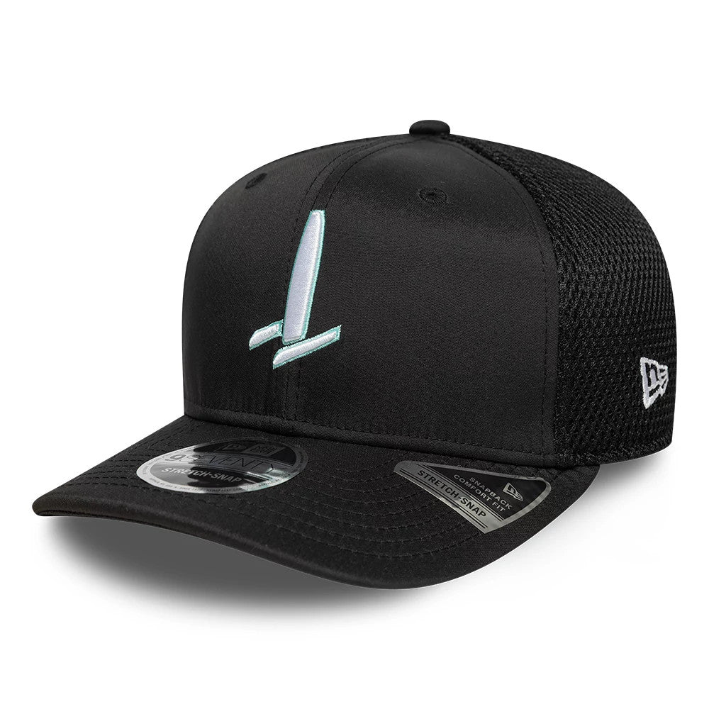 Sail GP Catamaran Black New Era 9SEVENTY Stretch Snap Adjustable Cap, front view showing a light blue catamaran embroidered on the black front panel, with a matching black curved visor and a 9SEVENTY size sticker on top.