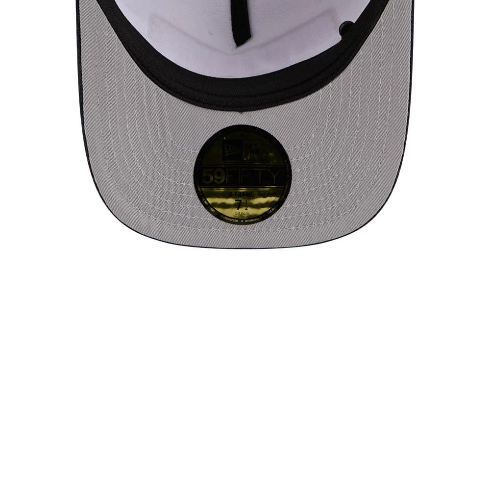 Pictured is this New Era 59FIFTY Day 59FIFTY A-Frame Fitted cap in navy. 2