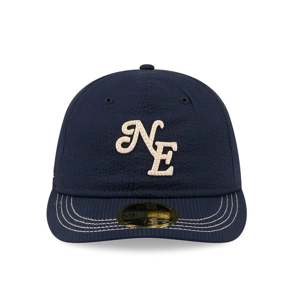 Pictured is this New Era 59FIFTY Day Seersucker Retro Crown 59FIFTY Fitted cap in navy. 2