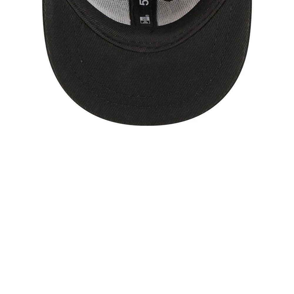 New Era 59FIFTY Day Black Mini 59FIFTY Fitted Cap, inside view showing a black sweatband, grey interior taping with a 59FIFTY pattern, and a black visor, highlighting the craftsmanship and detailed design of the cap's interior.