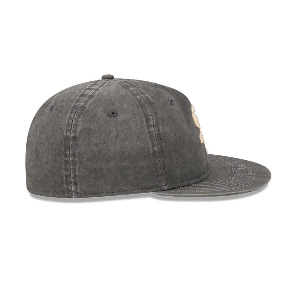 Chicago White Sox MLB 59FIFTY Day Black Retro Crown New Era 59FIFTY Fitted Cap, side view showing the slightly curved flat visor, black embroidered eyelets on the faded black crown, and raised front logo peeking from the side.