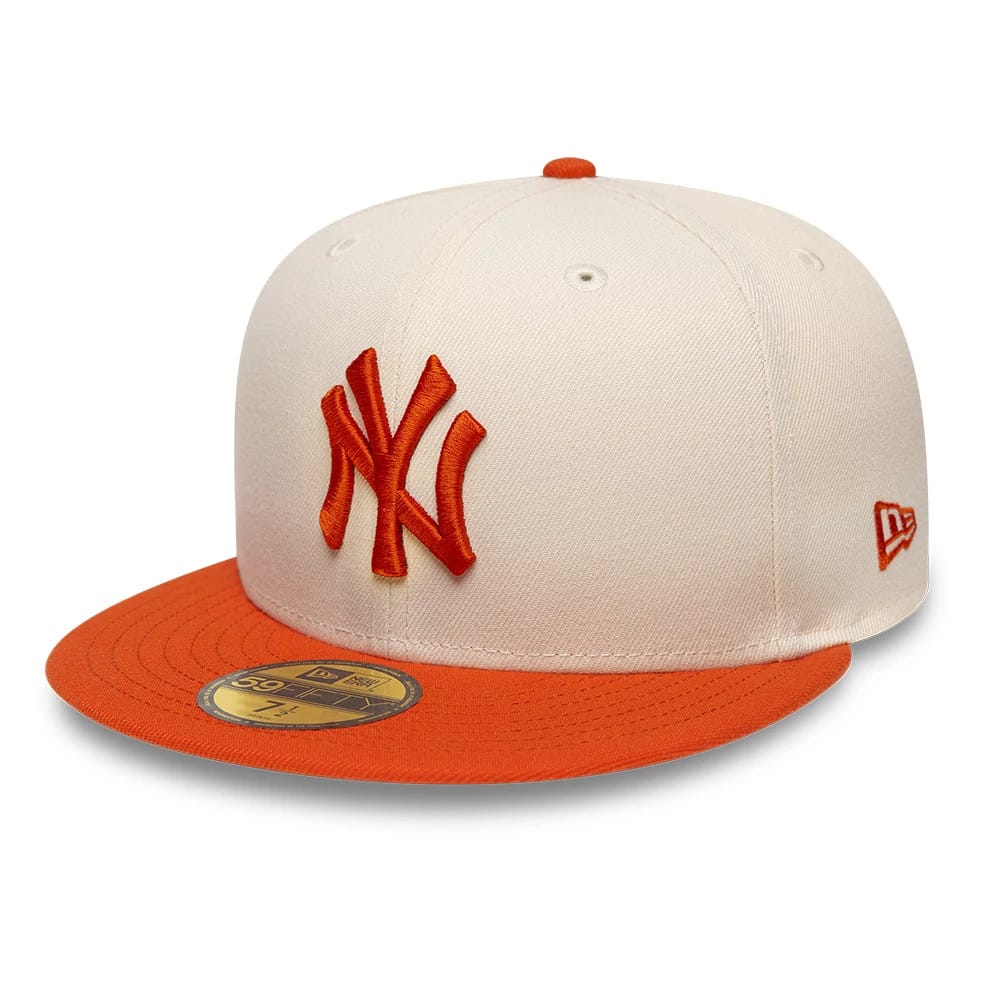 Pictured is this MLB League Essential New York Yankees 59FIFTY Fitted cap in cream. 1