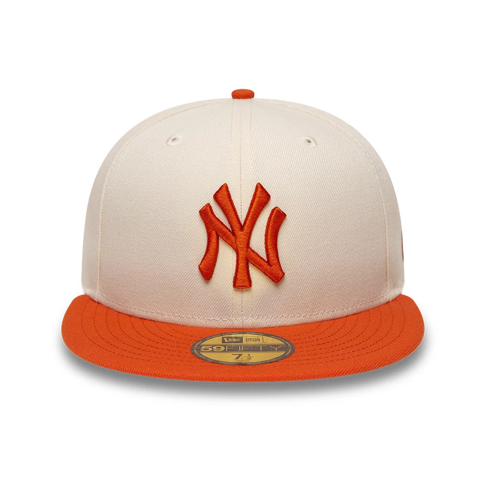 Pictured is this MLB League Essential New York Yankees 59FIFTY Fitted cap in cream. 3
