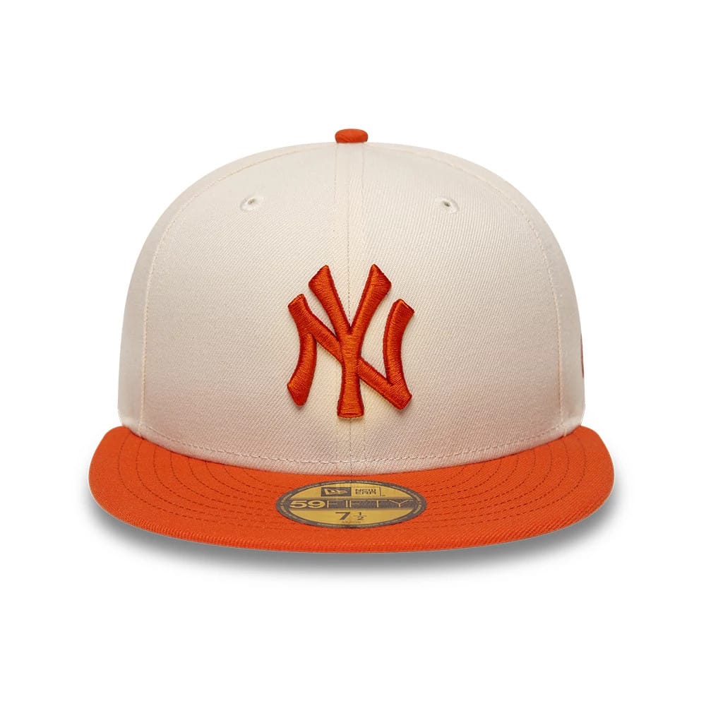 Pictured is this MLB League Essential New York Yankees 59FIFTY Fitted cap in cream. 3