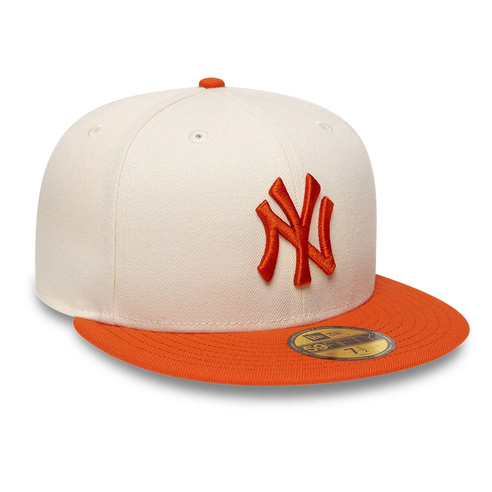 Pictured is this MLB League Essential New York Yankees 59FIFTY Fitted cap in cream. 4