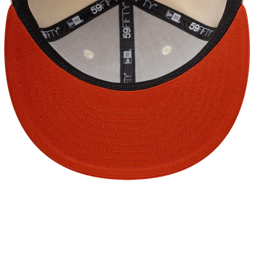 Pictured is this MLB League Essential New York Yankees 59FIFTY Fitted cap in cream. 2