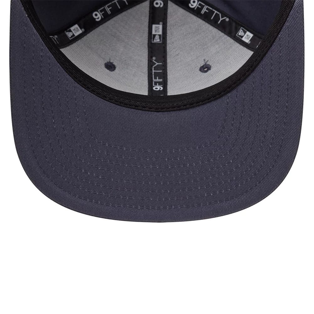 Pictured is this MLB League Essential New York Yankees 9FIFTY Snapback cap in dark grey. 5
