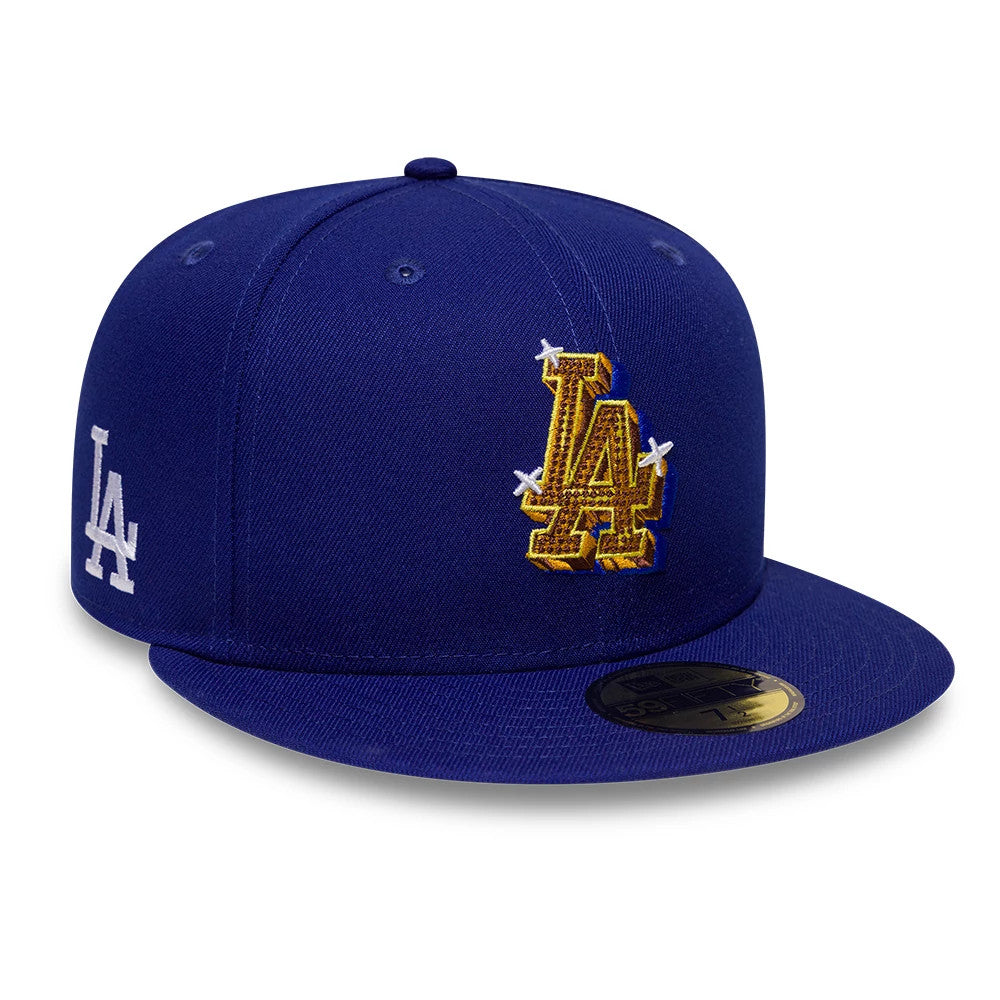 LA Dodgers MLB Emblem Dark Blue New Era 59FIFTY Fitted Cap, three-quarter view showing the raised gold and white LA logo on the front panel, a matching dark blue flat visor, and a gold 59FIFTY size sticker on the visor.
