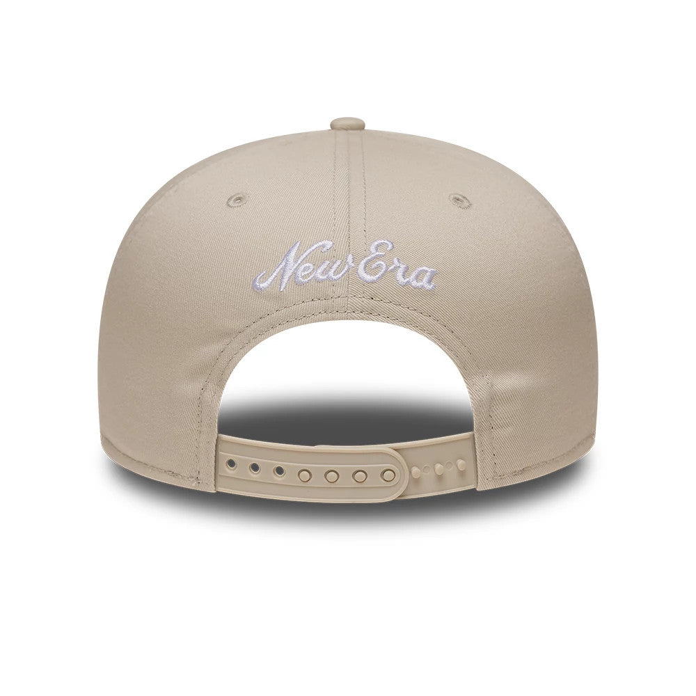Yankees MLB Outdoor Icon Light Beige New Era 9FIFTY Snapback Adjustable Cap, rear view showing the white embroidered New Era script at the centre back, with a light beige plastic snap closure and matching eyelets on the structured crown.