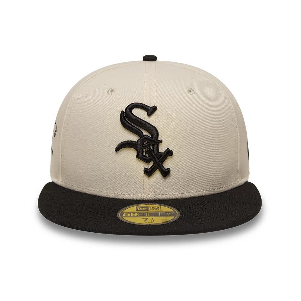 Pictured is this MLB Side Script Chicago White Sox 59FIFTY Fitted cap in cream & navy. 2