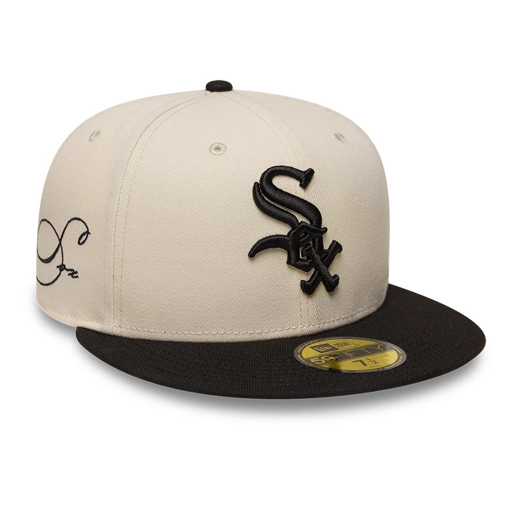 Chicago White Sox MLB Side Script Cream & Black New Era 59FIFTY Fitted Cap, three-quarter view showing the raised black embroidered Sox logo on the front panel, contrasting black visor, and a gold 59FIFTY size sticker on the visor.