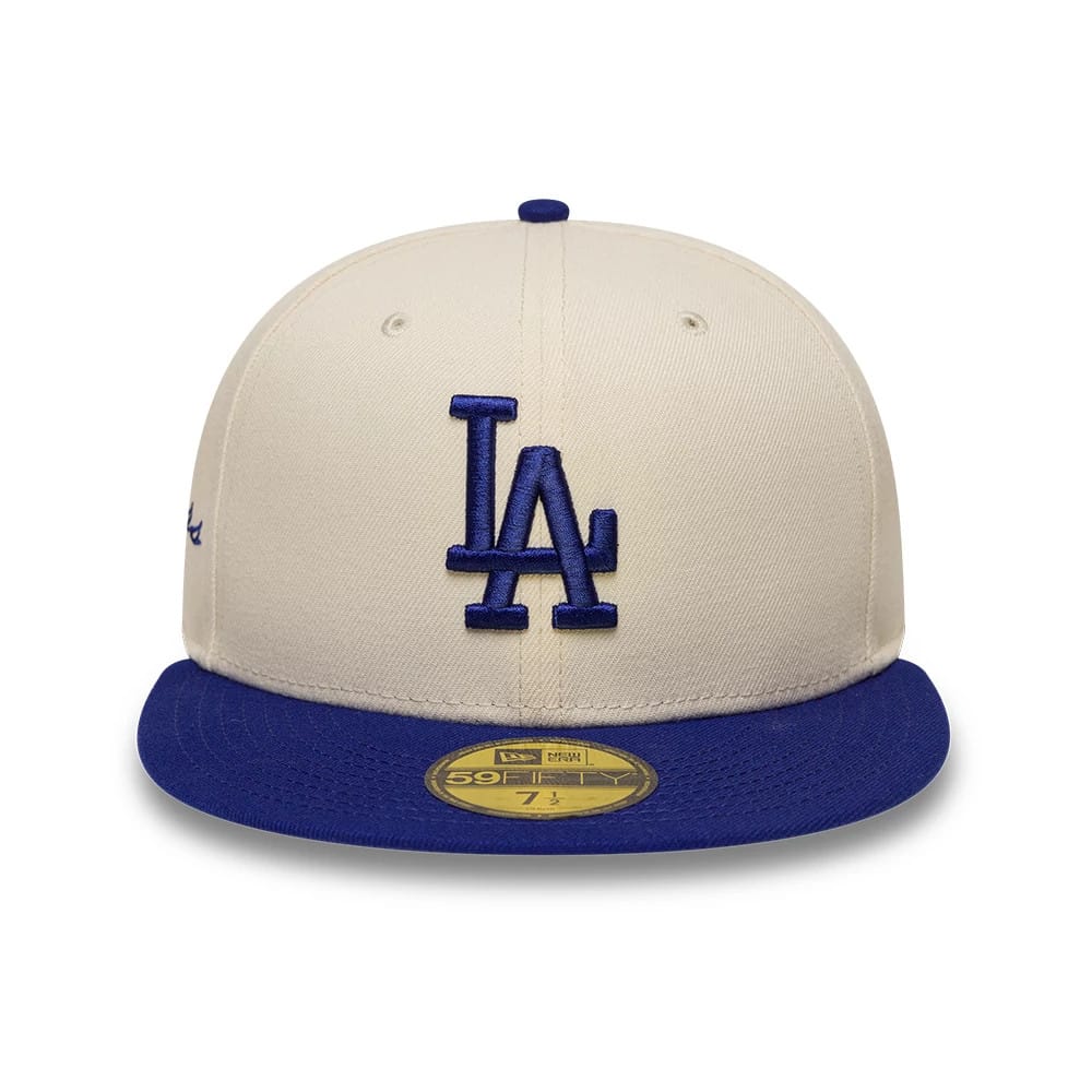 Pictured is this MLB Side Script LA Dodgers 59FIFTY Fitted cap in cream & blue. 2