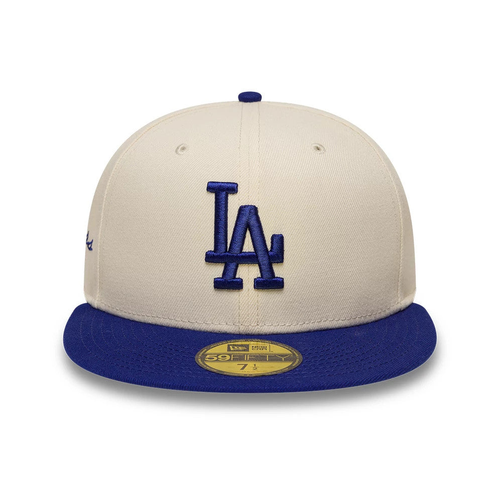 Pictured is this MLB Side Script LA Dodgers 59FIFTY Fitted cap in cream & blue. 2
