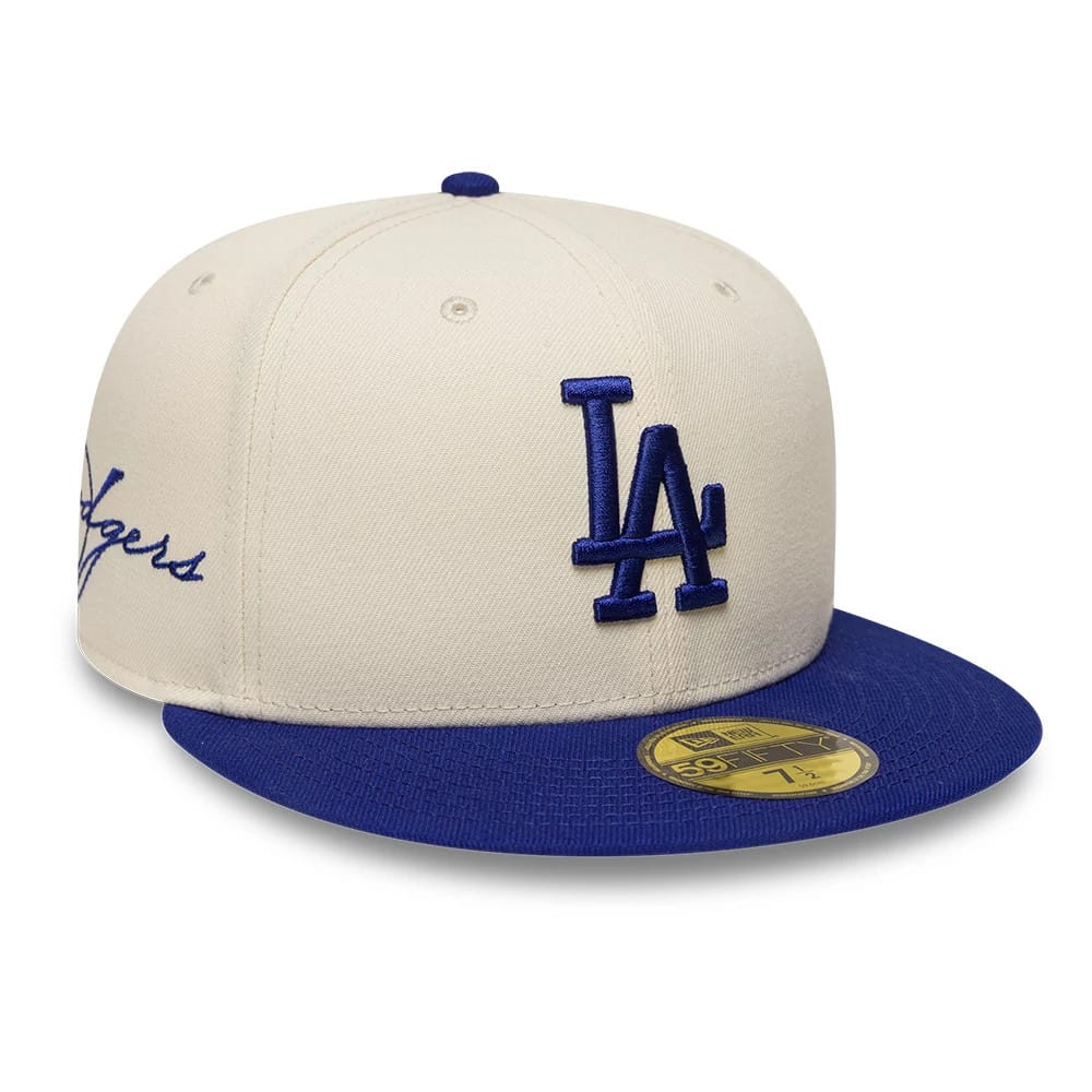 Pictured is this MLB Side Script LA Dodgers 59FIFTY Fitted cap in cream & blue. 1