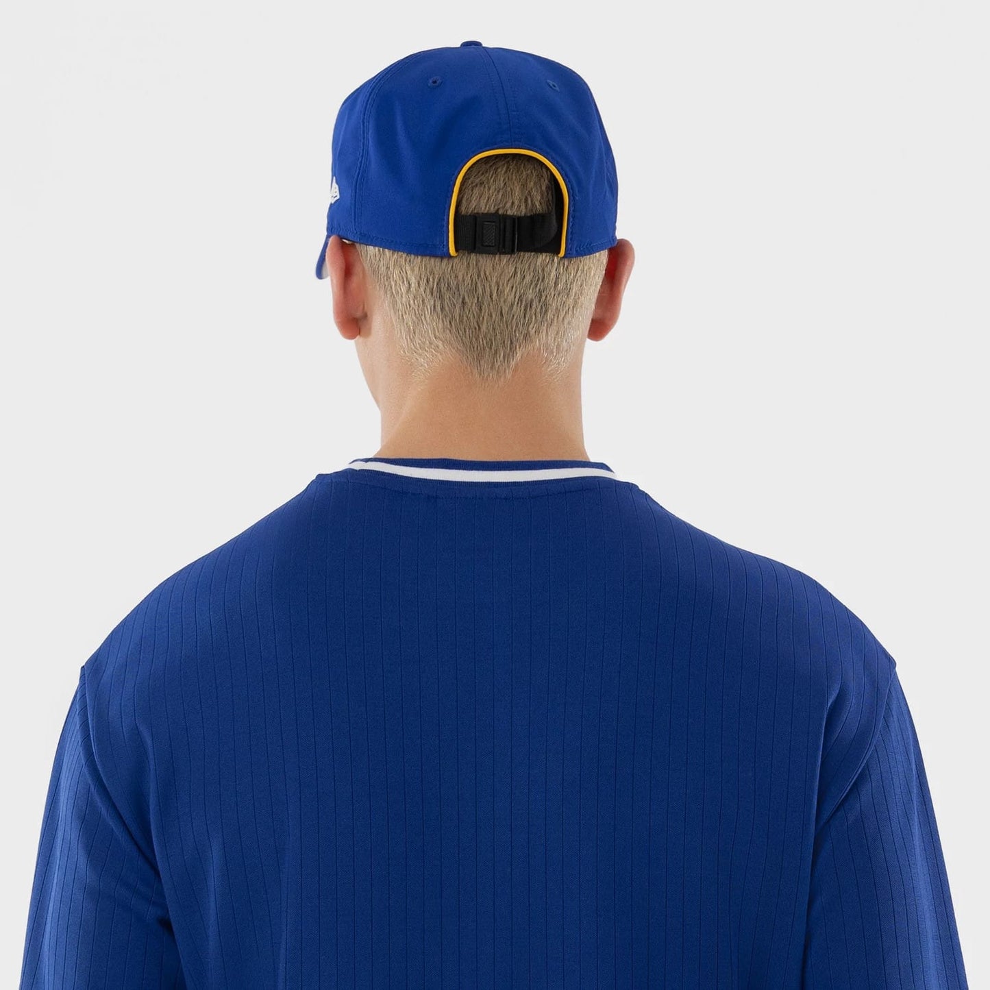 The model is wearing this LMB Charros De Jalisco Oversized T-Shirt in blue. 7
