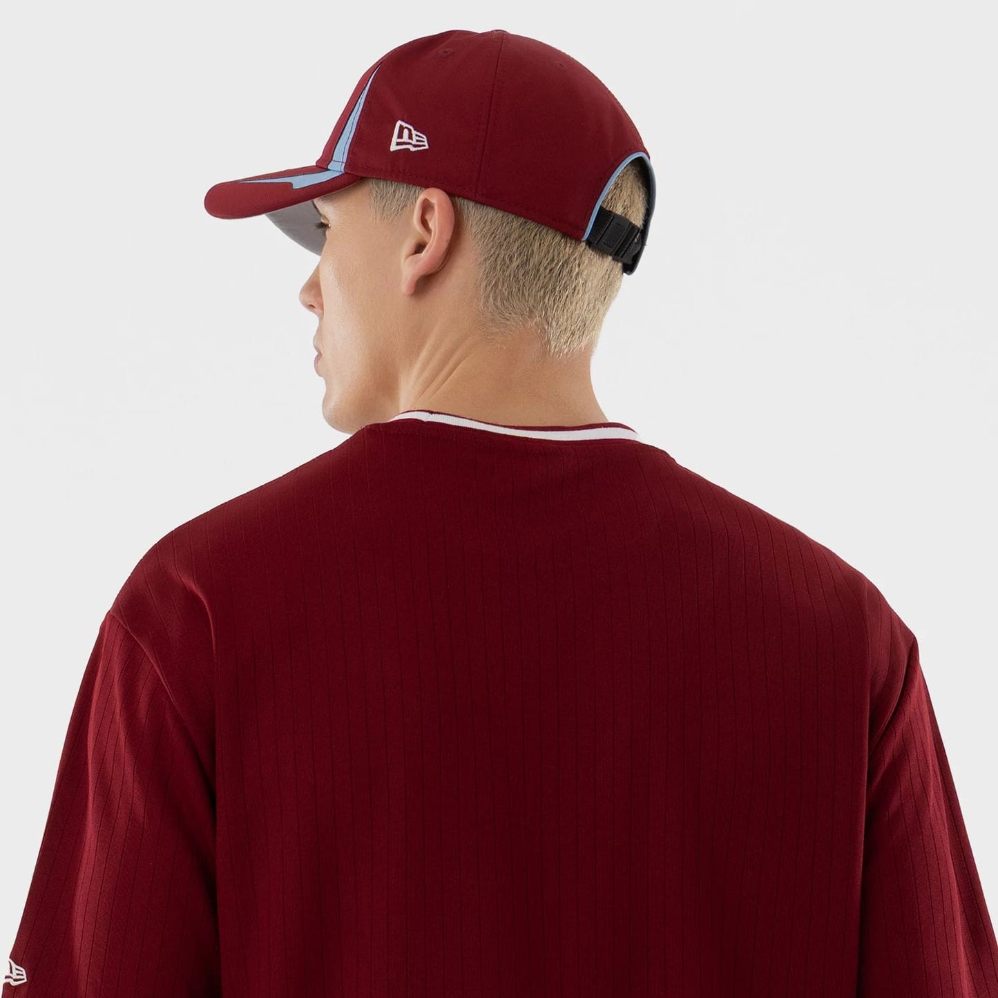 The model is wearing this MLB Philadelphia Phillies Oversized T-Shirt in dark red. 7
