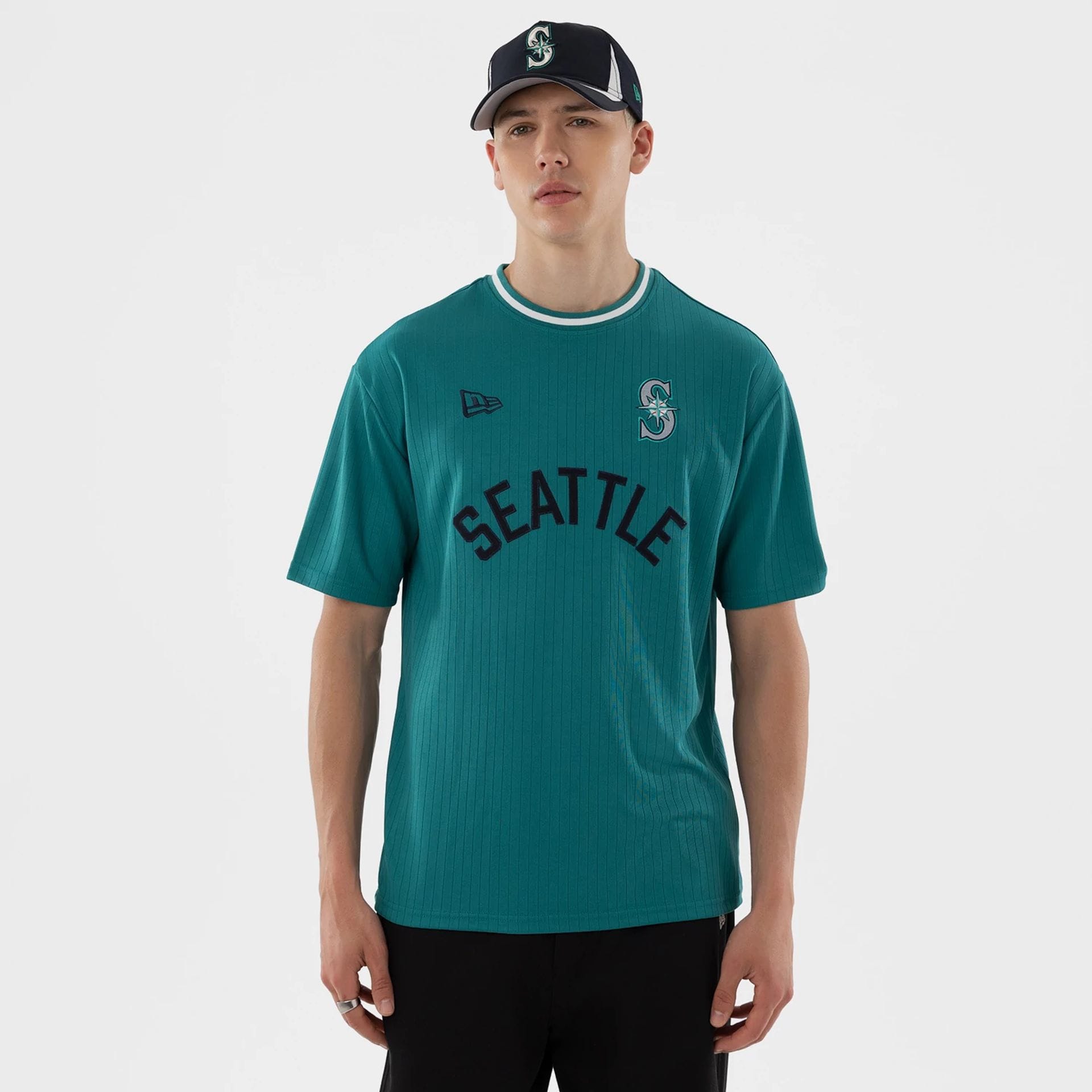 The model is wearing this MLB Seattle Mariners T-Shirt in green. 1
